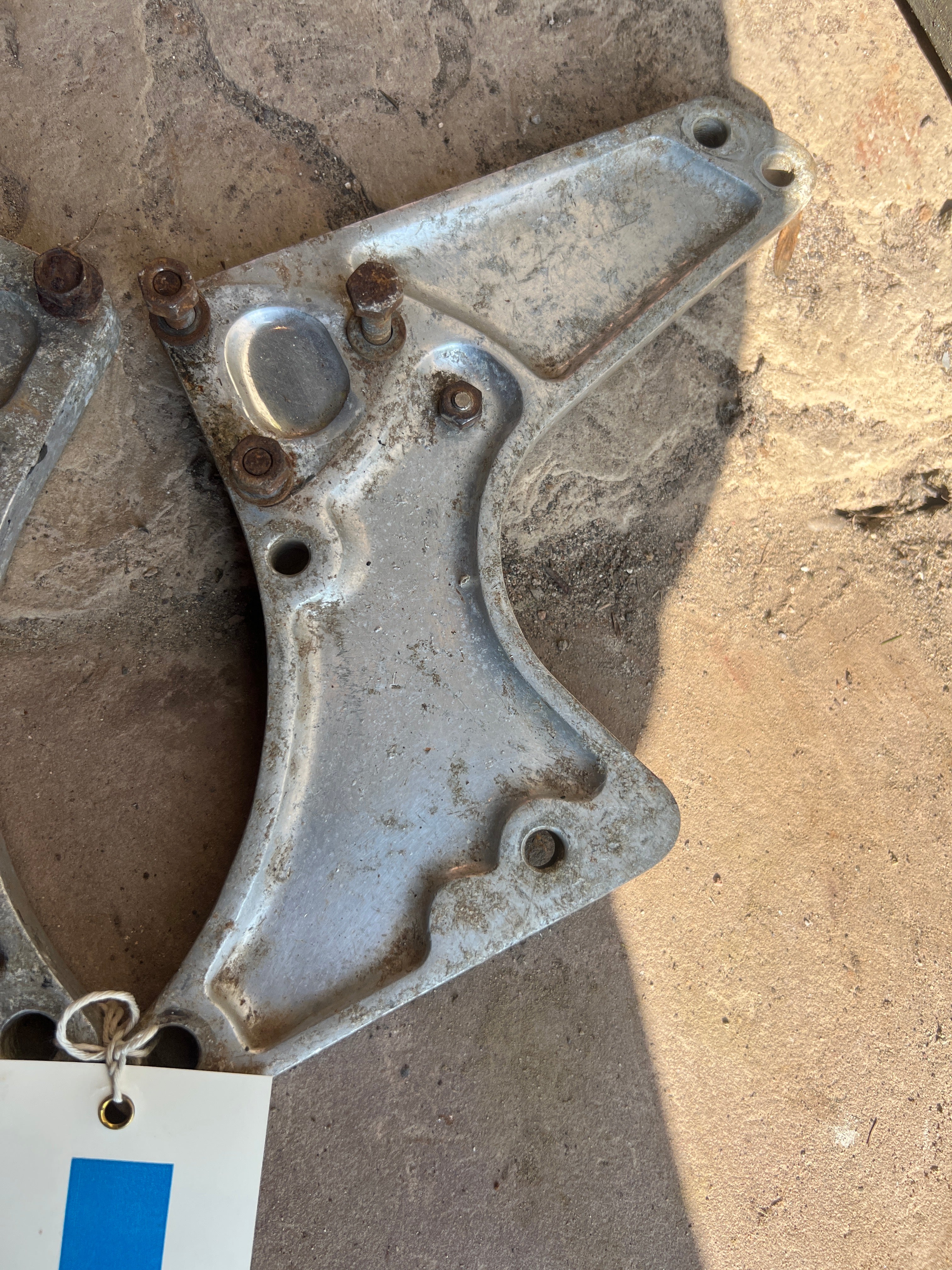 Norton Commando Alloy foot rest plates Second hand pair