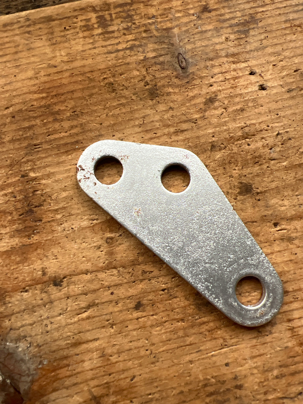 Norton  commando silencer bracket