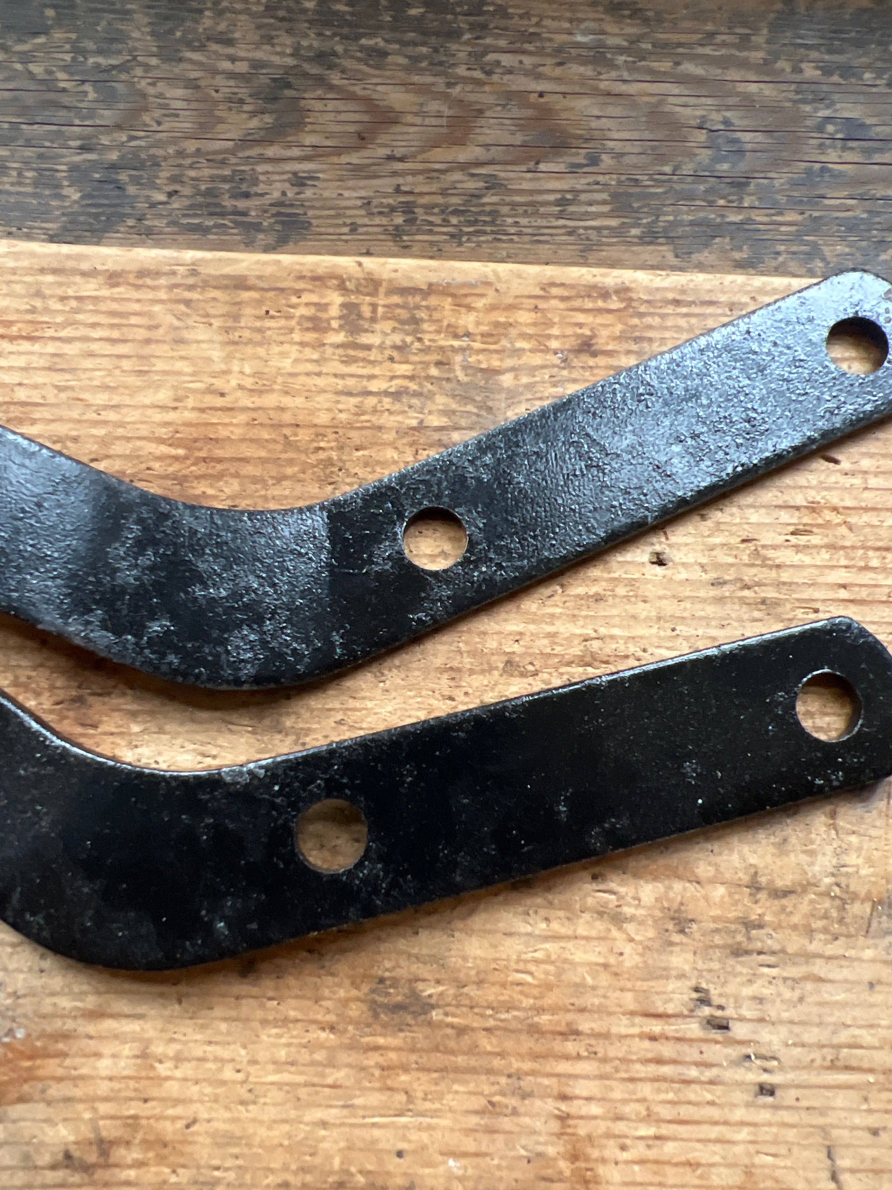Norton Commando SS high level muffler support brackets 062383 & 062384