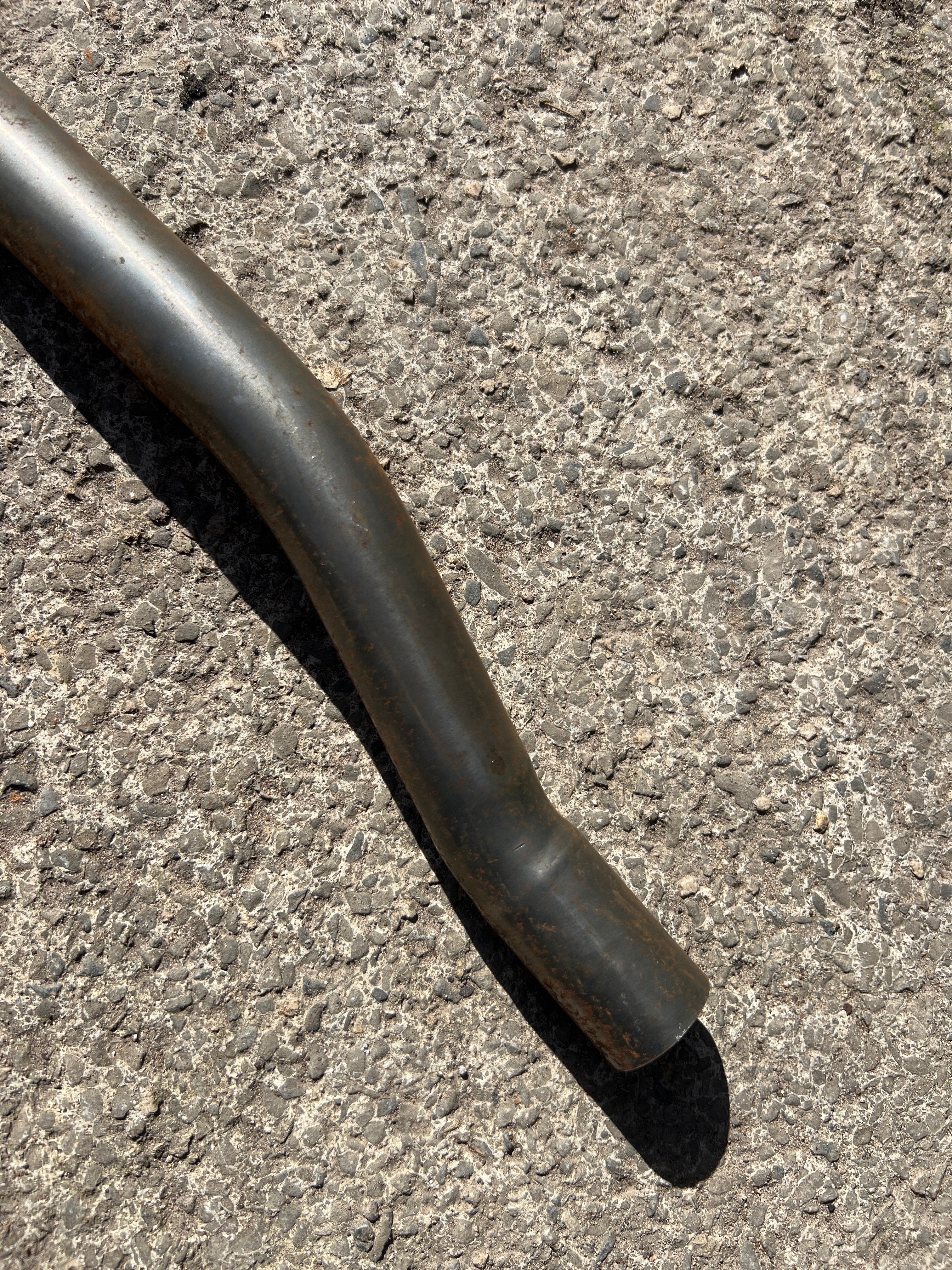 Triumph Tiger Cub inside frame high level exhaust pipe